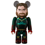 The Medicom (JP) Be@rbrick Series 49 Blind Box reveals a toy figure with mouse ears, a bearded man’s face, and a superhero-themed red and green outfit. Discover your character upon opening the blind box!.