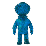 A blue, speckled figurine with a round head and textured surface resembling an astronaut or alien, akin to the intricate designs of Japanese vinyl toys found in Medicom (JP) VAG 36 - Deadman collections.