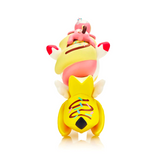 A Frozen Treats Unicorno - Lickity Split toy featuring a banana on top.