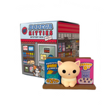A 100% Soft Bodega Kitties — Series 2 Blind Box vinyl cat figurine sits by mini cereal boxes, with the colorful blind box in the background, offering a fun surprise random design.