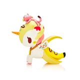 Limited Edition Frozen Treats Unicorno - Lickity Split figurine featuring a banana on its head by tokidoki (IT).