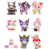 A collection of nine kawaii figurines, featuring My Melody and Kuromi among other characters in colorful, playful designs, some with animals or food themes, arranged in a 3x3 grid style against a white background. Perfect for fans of the tokidoki x Kuromi & My Melody Garden Party Blind Box series from Tokidoki.