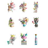 Nine pastel, unicorn-themed tokidoki (IT) 20th Anniversary Blind Box collectibles are arranged in a 3x3 grid on a white background, each with unique accessories and costumes—perfect for any collector.
