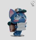 A blue cartoon cat figurine with a cap and backpack holds a map. This unique “1/36 RARE” figure is from the Widdle Baby Blind Box series by Kaleidos Creative, making it a special collectible.