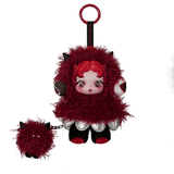 The Pop Mart You Found Me Skullpanda Plush Figure Blind Box features a plush doll with red hair and a fluffy red costume, black shoes, and a matching small fluffy accessory attached to a chain—perfect as an adorable dolly accessory or plush bag charm. The figure is displayed against a white background.