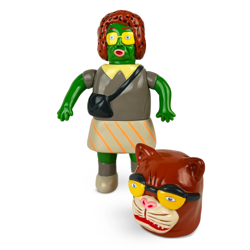 The Koara Obasan — S2V3 - Puma by Paradise Toy (TW) features a figure with green skin, brown hair, glasses, and a skirt, accompanied by a separate cat-like head also wearing glasses.