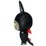 Side view of a black How2Work (HK) Zimomo- Devil vinyl figure with yellow eyes, sharp teeth, red wings, and a spiked tail—an ideal collectible for fans of devil plush designs.