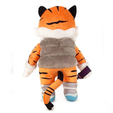An artist in Chicago created a King Tiger Plush by Ali Six wearing a gray vest as part of their urban art collection.