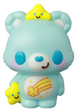 The VAG 42 — Care Bears by Medicom (JP) is a light blue bear vinyl toy with blue cheeks, a smiling face, and shooting star belly design. It holds a yellow star and has another on its head, inspired by Japanese vinyl artists and gacha collectibles.