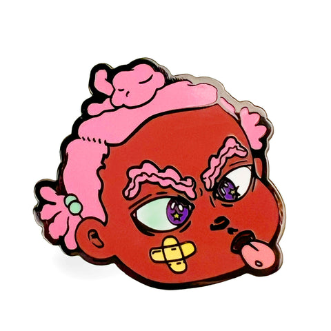 Illustration of a Black girl with pink hair, star-shaped eyes, and a bandage on her face, sticking out her tongue. Inspired by the vibrant style of Bianca Pastel, the Binky Tongue Out Hard Enamel Pin by Rotofugi (US) would make a perfect addition to any collection.