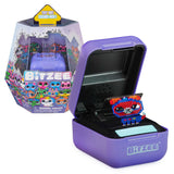 A purple Spinmaster box with a touch-sensitive Bitzee - Interactive Digital Pet set inside.