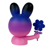 The Blake Jones' Flower Picker — Twilight figure by UVD Toys (US) showcases a limited edition bunny figurine with a pink and purple gradient, holding a perfectly round purple flower and adorned with dark gradient ears.