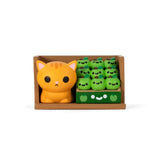 The Bodega Kitties — Series 2 Blind Box by 100% Soft features cute orange cat and green apple figures, each with a unique, surprise design for a delightful unboxing experience.