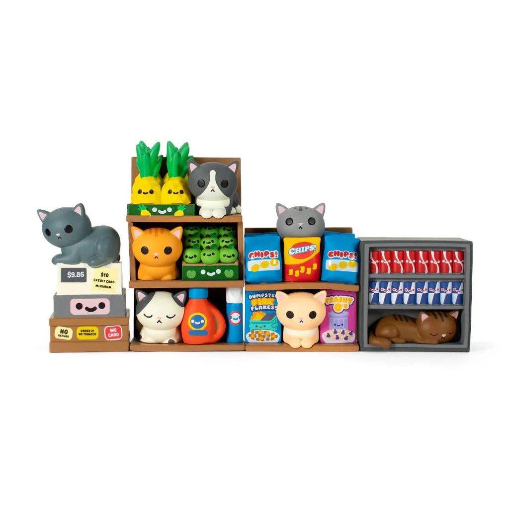 The Bodega Kitties — Series 2 Blind Box by 100% Soft features cartoon cat figurines as food and grocery items, each packaged in a blind box for a fun surprise bodega-themed collectible experience.
