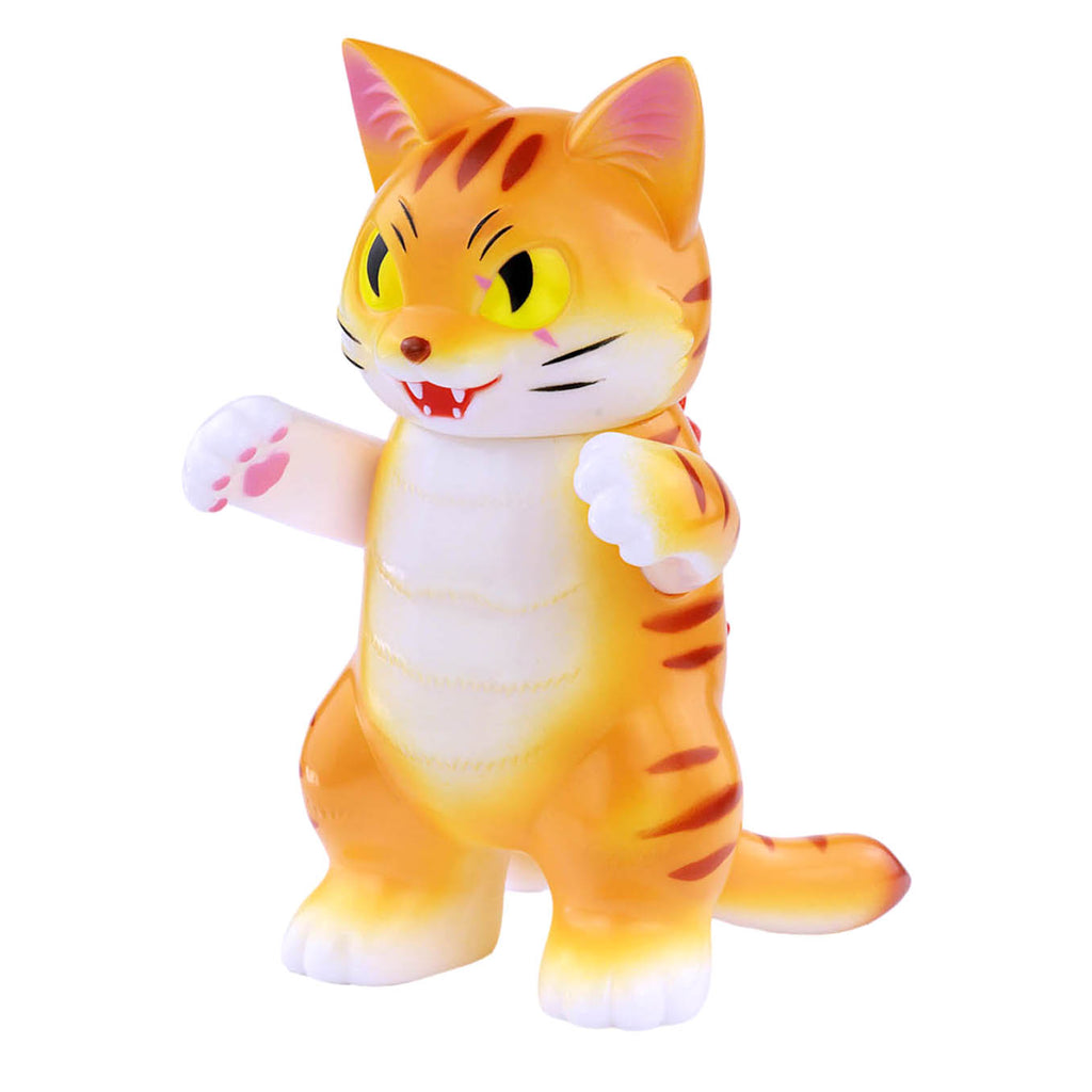 The orange and yellow Boss Negora—Original by Konatsuya (JP) is a cartoon cat figurine with raised paws and an open-mouthed expression, capturing the playful energy of Negora.