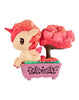 The tokidoki Botanical Bonsai Unicorno Blind Box features a small Unicorno with a pink mane beside a pink tree in a decorative planter—perfect for fans of tokidoki and miniature garden collectibles.