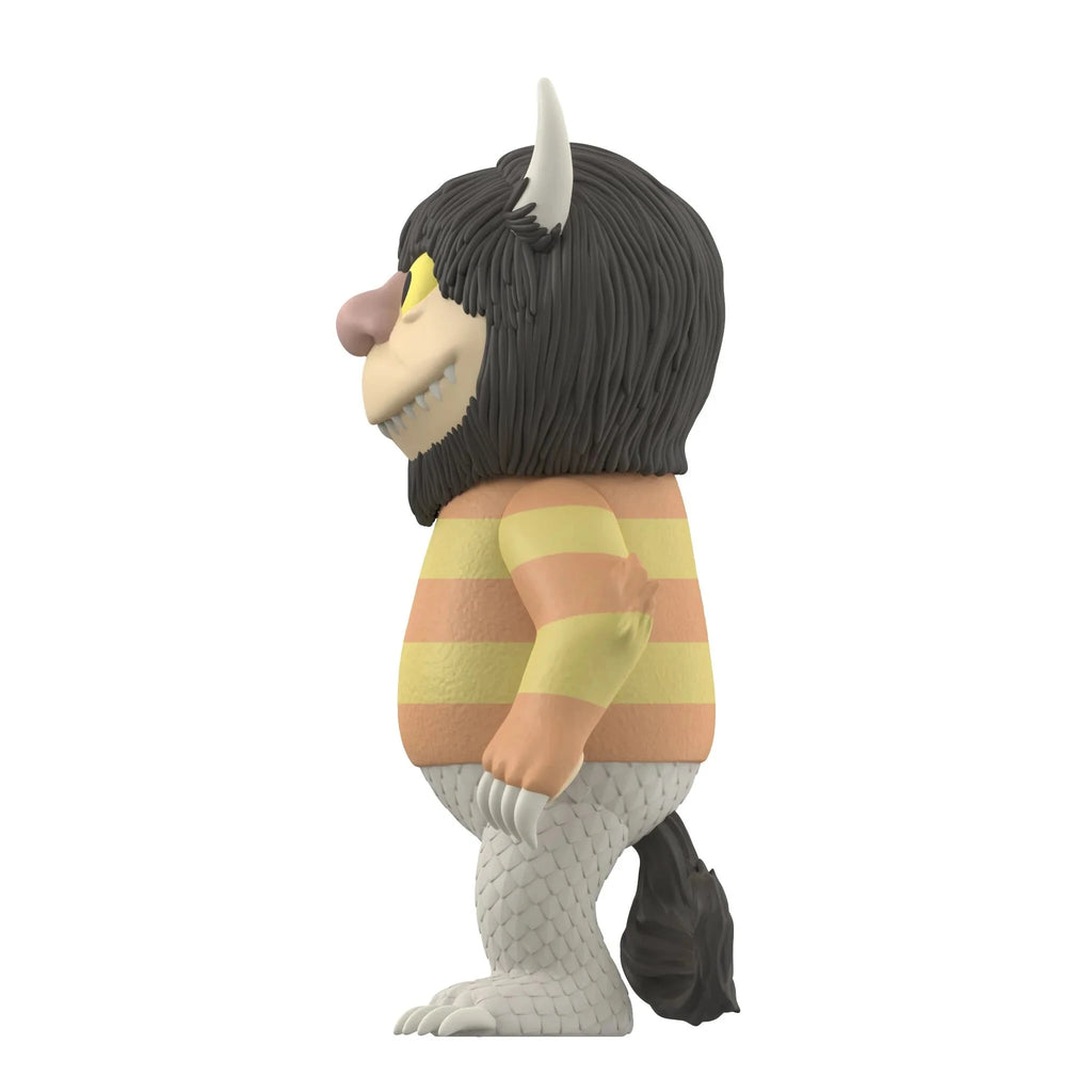 Side view of Super 7 (US) Where the Wild Things Are ReAction Figure - Carol, a Maurice Sendak-inspired monster with shaggy dark hair, striped shirt, horns, claws, scales, and tail—just like in the classic story.