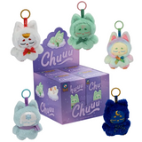 Five plush cat keychains, each a unique color and design, are arranged around a purple box labeled “Chuu Collectible Bag Clip Blind Box” by Kaleidos Creative, all featuring the same whimsical cat character and starry motif. Each charming keychain doubles as a collectible bag clip, perfect for bringing Kaleidos Creative’s magical sprite charm to your favorite accessories.