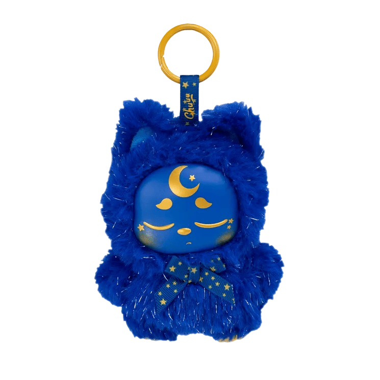 Introducing the Chuu Collectible Bag Clip Blind Box by Kaleidos Creative—a whimsical blue plush keychain featuring Chuuu, the magical sprite with closed eyes, a yellow crescent moon and star accents on its face. Dressed in a fuzzy suit adorned with star patterns and finished with a ribbon, this charming accessory includes a gold ring for attaching to keys or your favorite bag. Perfect for collectors and anyone who loves cute, magical designs!.
