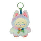 A pastel rainbow plush keychain shaped like a sleepy animal with closed eyes, large ears, and a ribbon around its neck. This magical sprite features a green plastic loop on top for attachment, making it the perfect Kaleidos Creative Chuu Collectible Bag Clip Blind Box accessory.