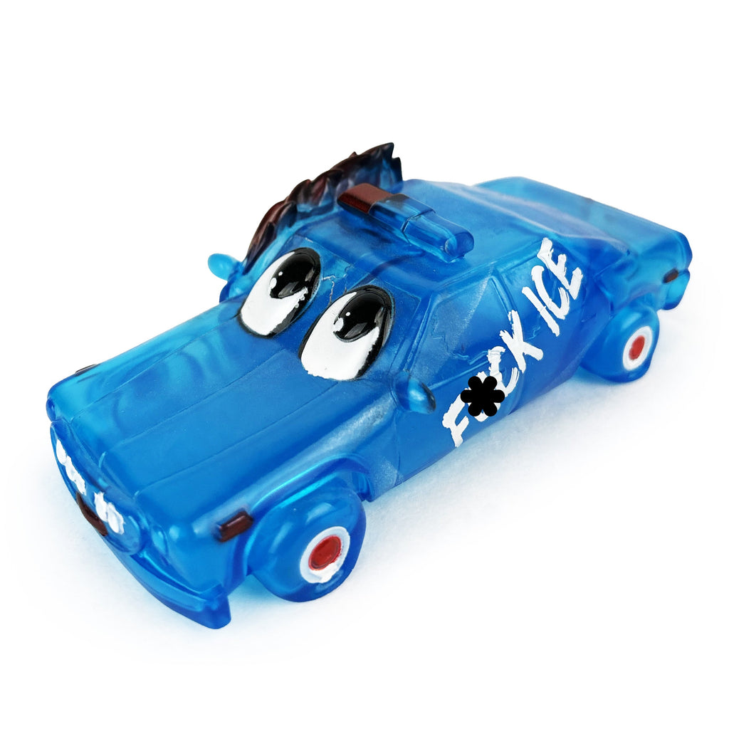 The ACABY — F*ck ICE Edition, a limited-edition toy car from DoomCo Designs (US), is made of clear blue vinyl and flaunts cartoon eyes with a playful yet bold 