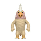 A humanoid creature with pink and beige feathers, yellow beak, wide yellow eyes, clawed hands, and bird-like feet stands upright—a Super7 (US) Where the Wild Things Are ReAction Figure - Douglas—against a white background.