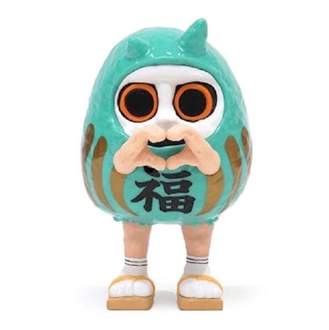 A small Daruma figurine by How2Work (HK) with large eyes and a green, hooded costume featuring Japanese characters, standing with its hands forming a heart shape.