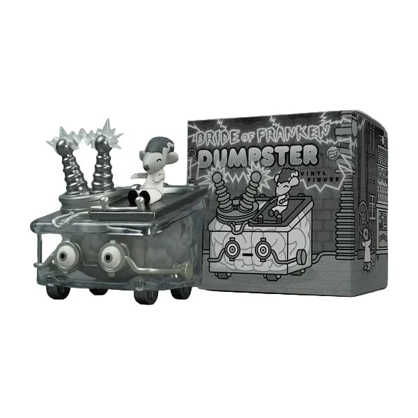 The 100% Soft Bride of Frankendumpster Vinyl Figure is a glow-in-the-dark collectible styled as Frankenstein’s bride in a dumpster-shaped vehicle, displayed beside its illustrated packaging.