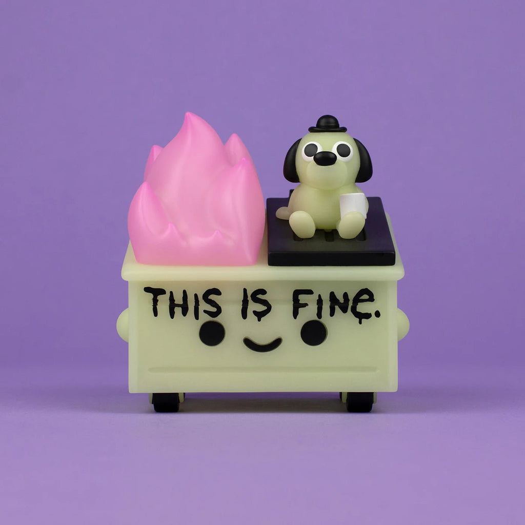 A toy with a Dumpster Fire — This is Fine Glow Edition on a purple background, reminiscent of a dumpster fire by 100% Soft.
