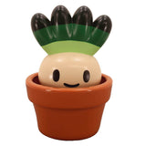 A charming plant creature named Hakusai-kun with a smiling face and green, leafy top sits in a brown pot, echoing the playful Vinyl Artist Gacha aesthetics by Fewmany (JP).