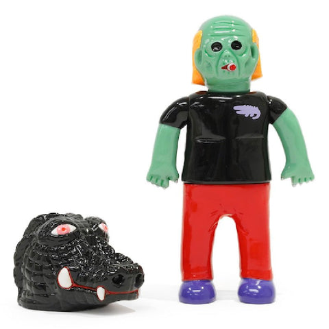 A green toy figure with a black shirt, red pants, and orange hair stands beside an About Animals Kembuyama Kumabee— Crocodile 2nd by Paradise Toy (TW).