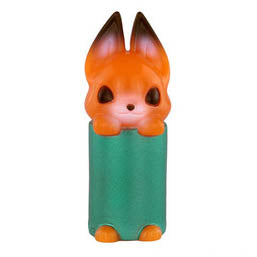 The orange rabbit figurine with tall ears peeking over a green cylinder base is playful like Japanese art, almost as charming as Konatsuya's (JP) 