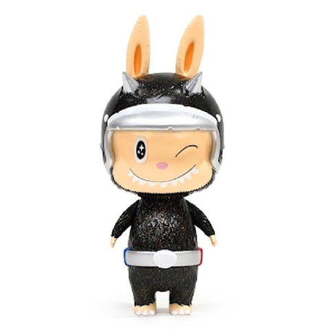 A Hug Hug Cat Labubu by How2Work (HK) with a winking face, wearing a black outfit with bunny ears, a helmet, and a belt with red and blue accents.