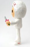 A side view of Little Peace by How2Work (HK) shows a white figurine in a hooded suit holding a flower sword plush with a pink flower-shaped hilt. The cute plush has big, long-lashed eyes and stands against a plain background.
