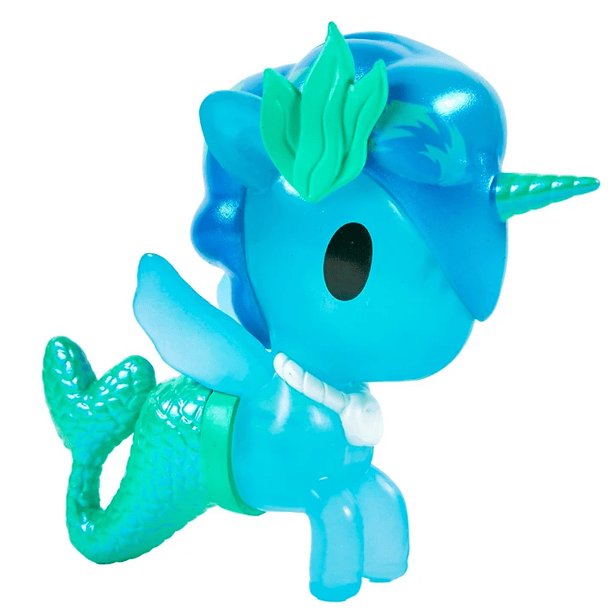 The Magical Tides Mermicorno Tokidoki by tokidoki features a blue and green toy unicorn with a mermaid tail, wings, green horn, black eyes, blue mane, and a green leaf-like fin on its head. Brimming with ocean-inspired charm, this enchanting figure is perfect for underwater adventures—just like the magical creatures in the Mermicorno Blind Box collection.
