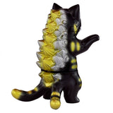 The Negora—Black Tiger by Konatsuya (JP) is a monstrous kitty cat figure featuring spiked, fin-like elements and a striking blend of black, yellow, and silver hues from behind.