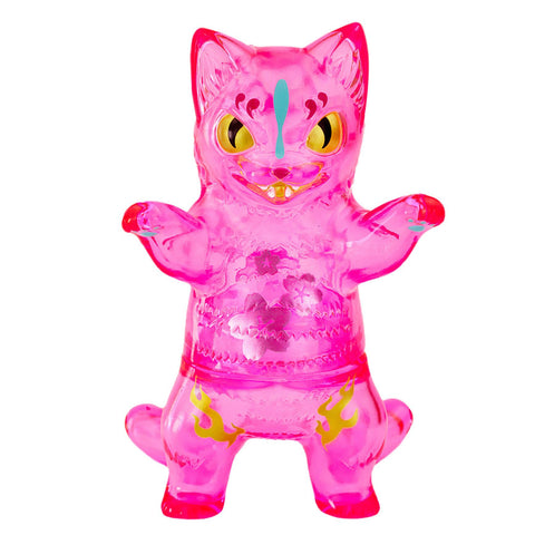 The Negora — Sakura 2025 by Konatsuya (JP) is a translucent pink kitty figure featuring yellow eyes, a blue forehead mark, and yellow decorative patterns on its body.