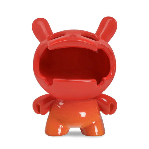 Add the Kidrobot Fine Ash Dunny 5" Ceramic Ashtray - Sunset Orange Edition to your décor—this vibrant ceramic piece features a round body, short limbs, large ears, and a wide open mouth. Ideal for collectors and fans of vintage style.