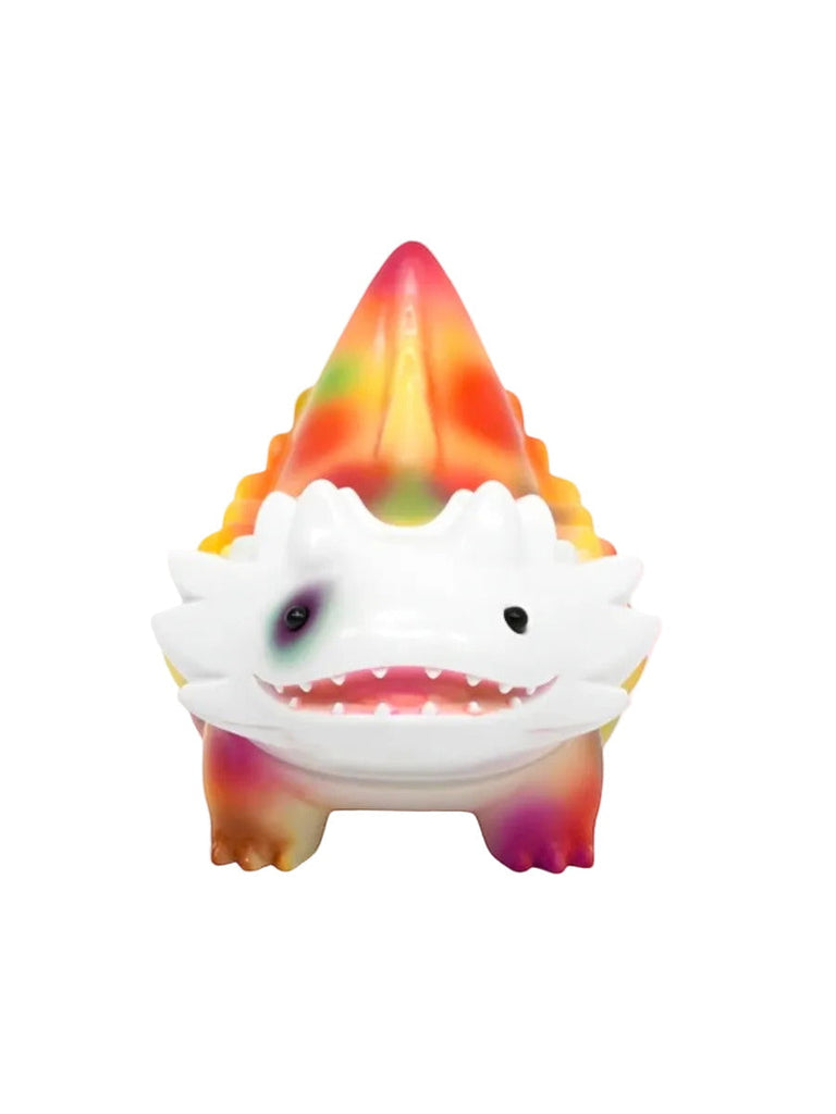 Seedlas Brother — Orange Dots by The Little Hut (HK) is a colorful plastic Kaiju dinosaur toy with a white face and multicolored body, inspired by Shoko Nakazawa, shown against a plain white background.