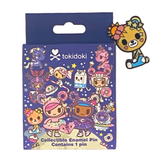 A package with a teddy bear and a Tokidoki - Digital Princess Enamel Pin Blind Box.