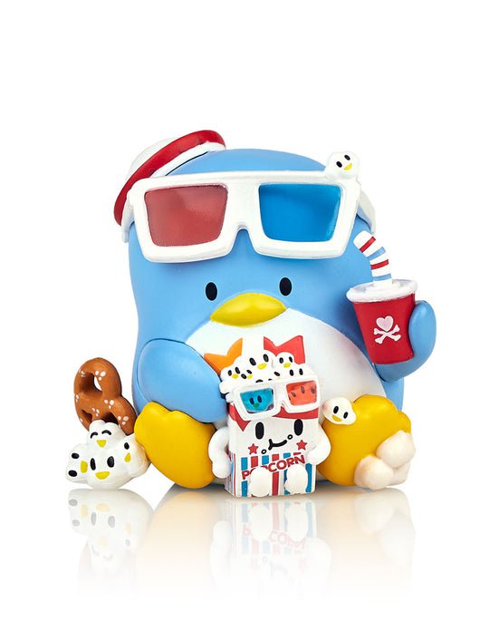 A figurine of a penguin with snacks, inspired by tokidoki (IT) merchandise.