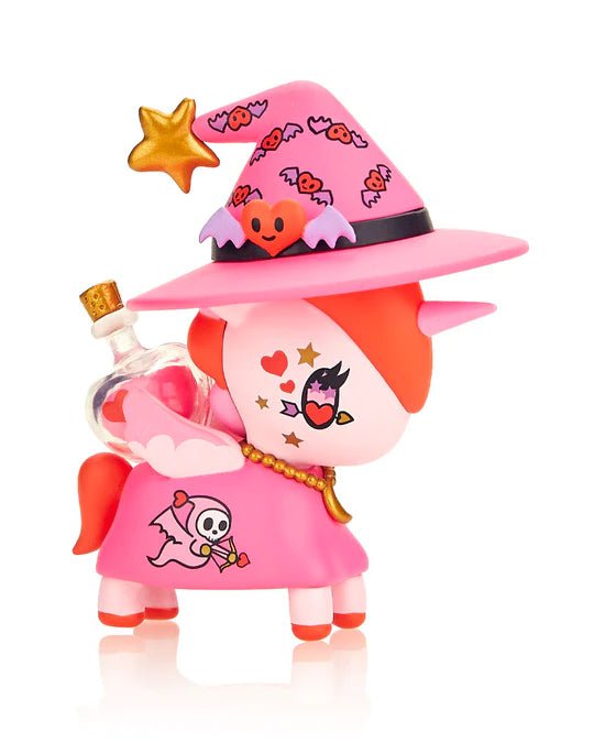 A pink Unicorno wearing a witch hat from the tokidoki After Dark unicorno Series 4 Blind Box.