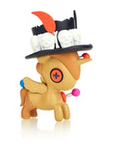A tokidoki After Dark unicorno Series 4 - Blind Box with a skull-adorned hat.