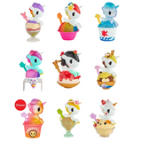 Discover the tokidoki Shaved Ice Dreams Unicorno Blind Box collection, featuring nine unicorn-themed collectible toys inspired by a variety of sweet treats such as parfaits, shaved ice, ice cream, and drinks. Each Unicorno is adorned with colorful decorations and comes with tiny accessories—including the delightful Shaved Ice Dreams Unicorno. Every figure is packaged in a blind box for a fun surprise reveal, with one special “Chaser” design highlighted in red.