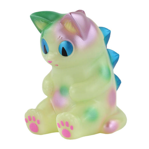The Sitting Negora — Dream Fantasy by Konatsuya (JP) is a pastel-colored vinyl toy with blue spikes, blue eyes, and pink paws, posed upright against a white background.