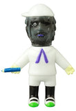 The VAG 42 - Toromikun by Yoshimoto Kogyo (Medicom JP) is a Japanese vinyl toy with a black face, one eye, purple lips, black hair, white cap and outfit, purple tie, blue object in hand, and green-white shoes—ideal for gachapon collectors.