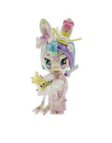 Celebrate with the tokidoki 20th Anniversary Blind Box by tokidoki (IT)! Each kawaii collectible features pastel pink, blue, and purple hair, a kimono, bows, stars, bunny ears, and a ribbon with smiling crowns—perfect for any surprise unboxing!.