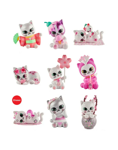 The Tokidoki Cherry Blossom Cats–Single Blind Box features collectible figurines inspired by cherry blossom season, each with pink floral accents and unique name labels, from the beloved Tokidoki brand.