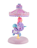 The tokidoki x Hello Kitty and Friends Sweet Pink Carousel Blind Box features a pastel carousel figurine with two characters riding a purple unicorn, heart accents on the base, and a decorative canopy.