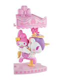A pink and white unicorn carousel figure with a small My Melody riding it, decorated with bows and hearts on a pink heart-shaped base—a must-have from the tokidoki x Hello Kitty and Friends Sweet Pink Carousel Blind Box by tokidoki.